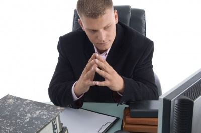 Free Digital Photos - Thinking Businessman In Office - Image courtesy of imagerymajestic at FreeDigitalPhotos